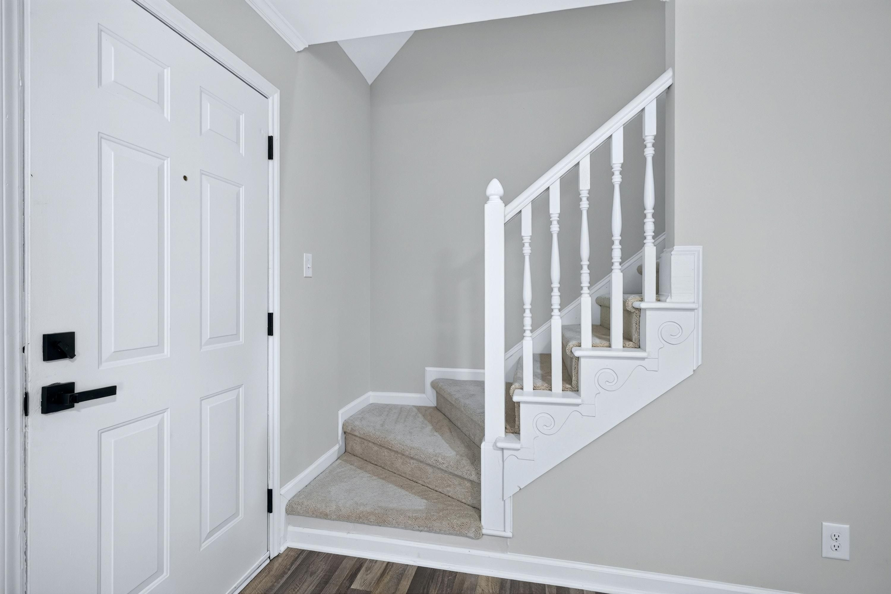 708 Powell Drive, Unit A Raleigh, NC 27606 - Photo 34 of 56 Stairway at front door area
