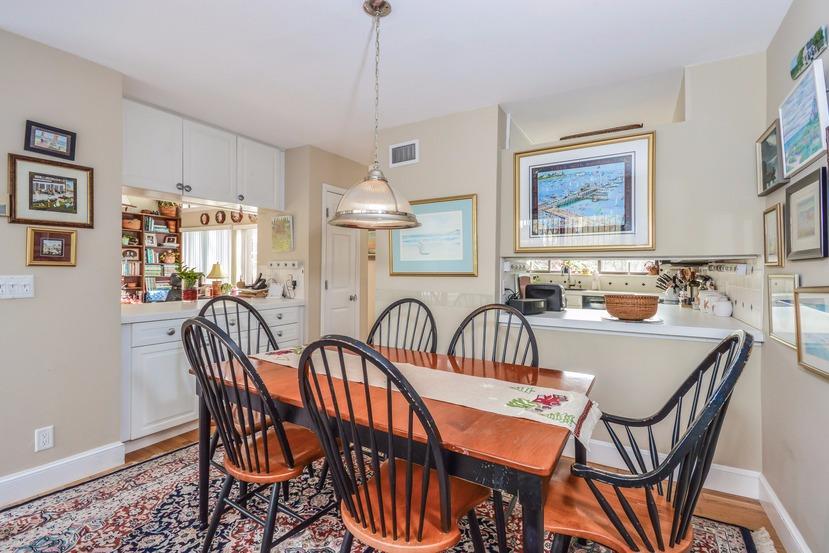 10 Sea Marsh Road Centerville, MA 02632 - Photo 11 of 31 a dining room with furniture a chandelier and window