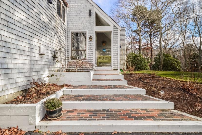 10 Sea Marsh Road Centerville, MA 02632 - Photo 3 of 31 a front view of a house