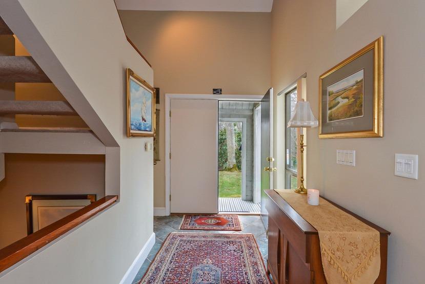 10 Sea Marsh Road Centerville, MA 02632 - Photo 4 of 31 a living room with a bed and a window