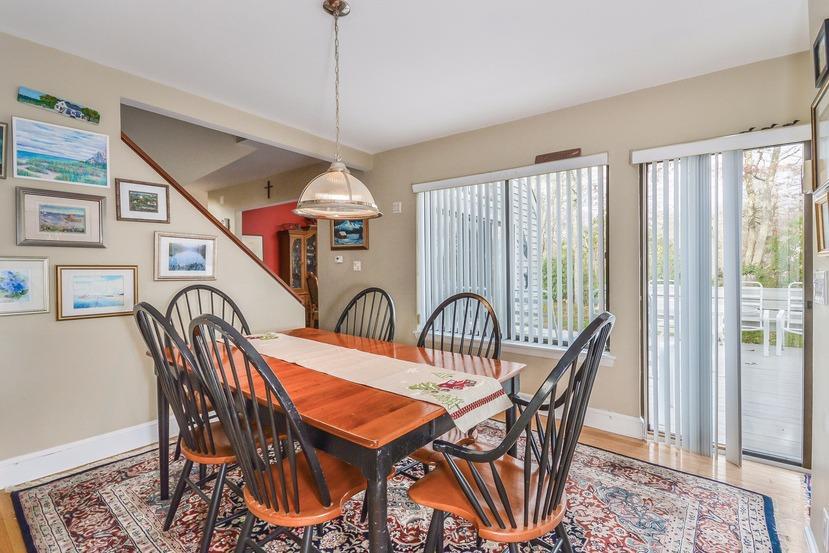 10 Sea Marsh Road Centerville, MA 02632 - Photo 10 of 31 a dining room with furniture a chandelier and wooden floor