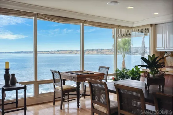 a view of a dining room with furniture window and outside view