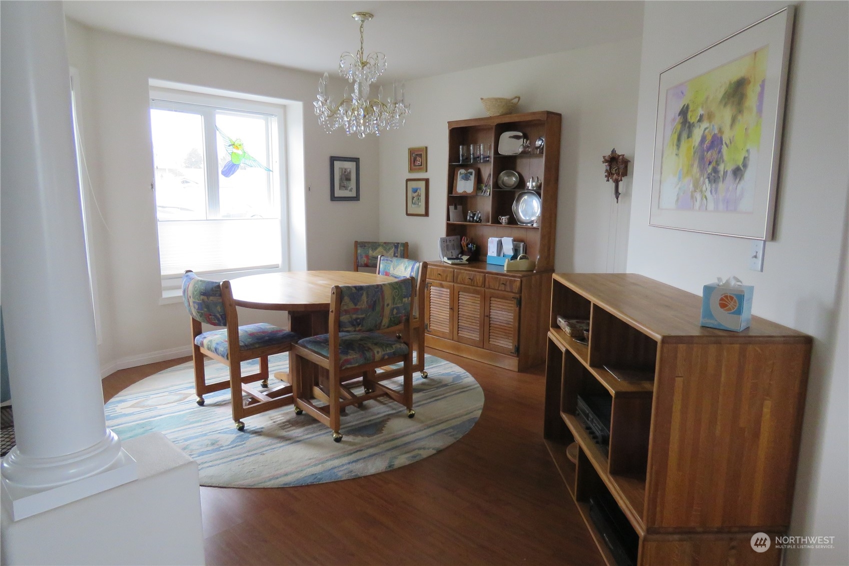 107 South Pass Road, Unit 28 Nooksack, WA 98276 - Photo 3 of 38 a view of a dining room with furniture window and wooden floor