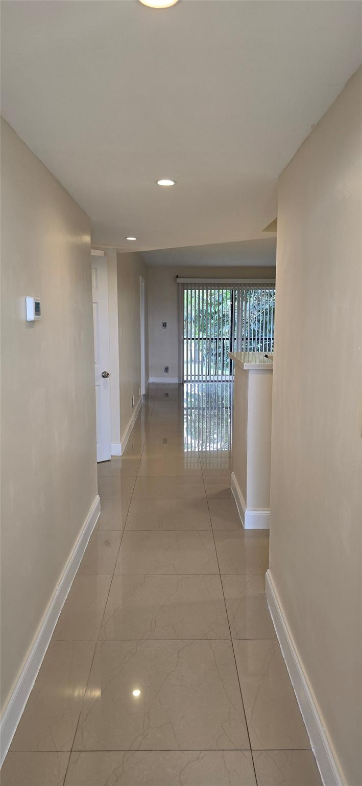 8000 South Colony Circle, Unit 309 Tamarac, FL 33321 - Photo 16 of 16 a view of an empty room with a window