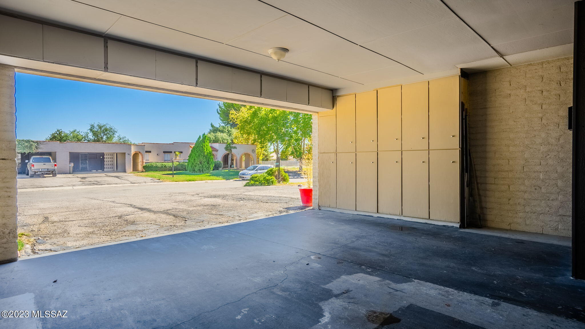 1176 Zircon Court Rio Rico, AZ 85648 - Photo 25 of 26 a view of empty room with wooden floor and fan