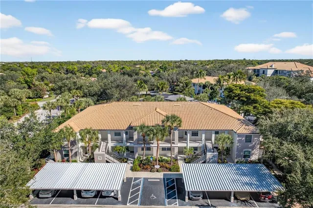 an aerial view of a house having patio