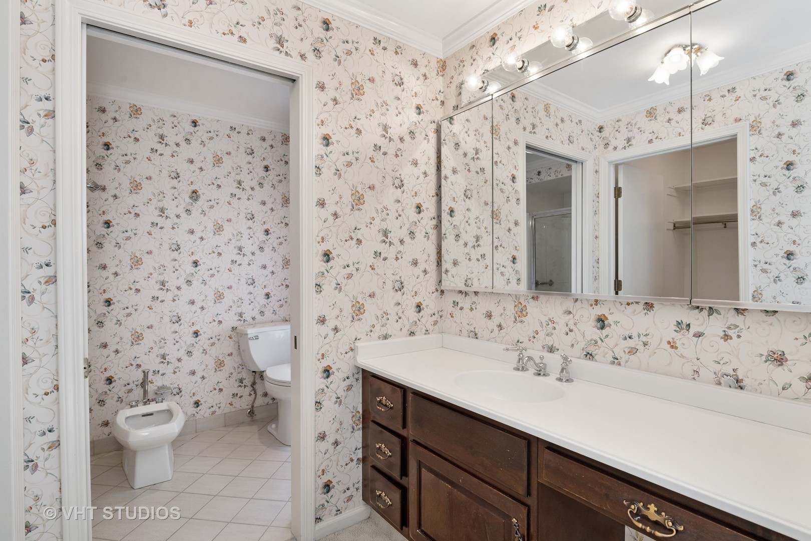 60 North Ridge Road Lake Forest, IL 60045 - Photo 21 of 36 a bathroom with a sink toilet and shower