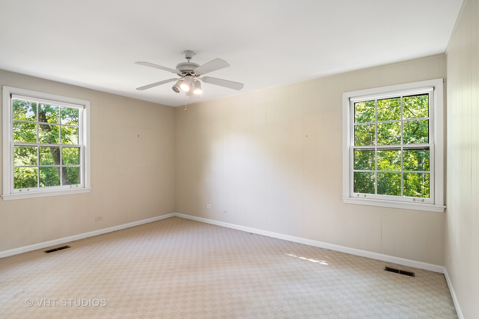 60 North Ridge Road Lake Forest, IL 60045 - Photo 23 of 36 an empty room with a window and a fan