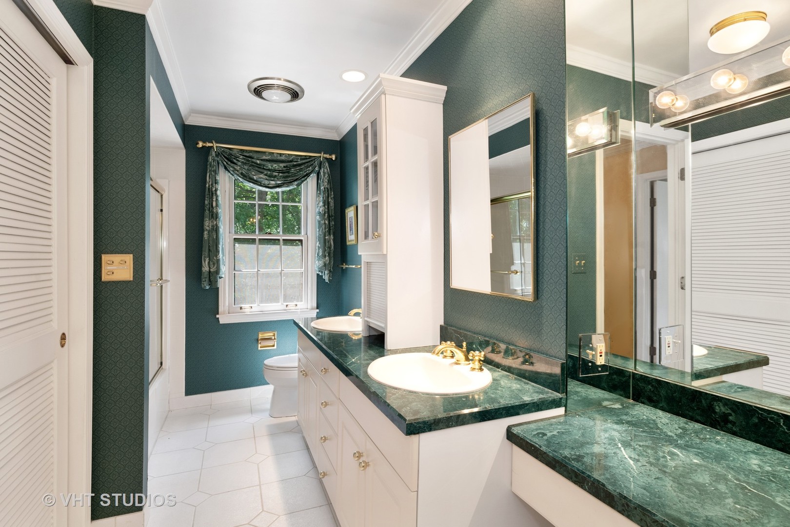 60 North Ridge Road Lake Forest, IL 60045 - Photo 24 of 36 a bathroom with a granite countertop sink and a mirror
