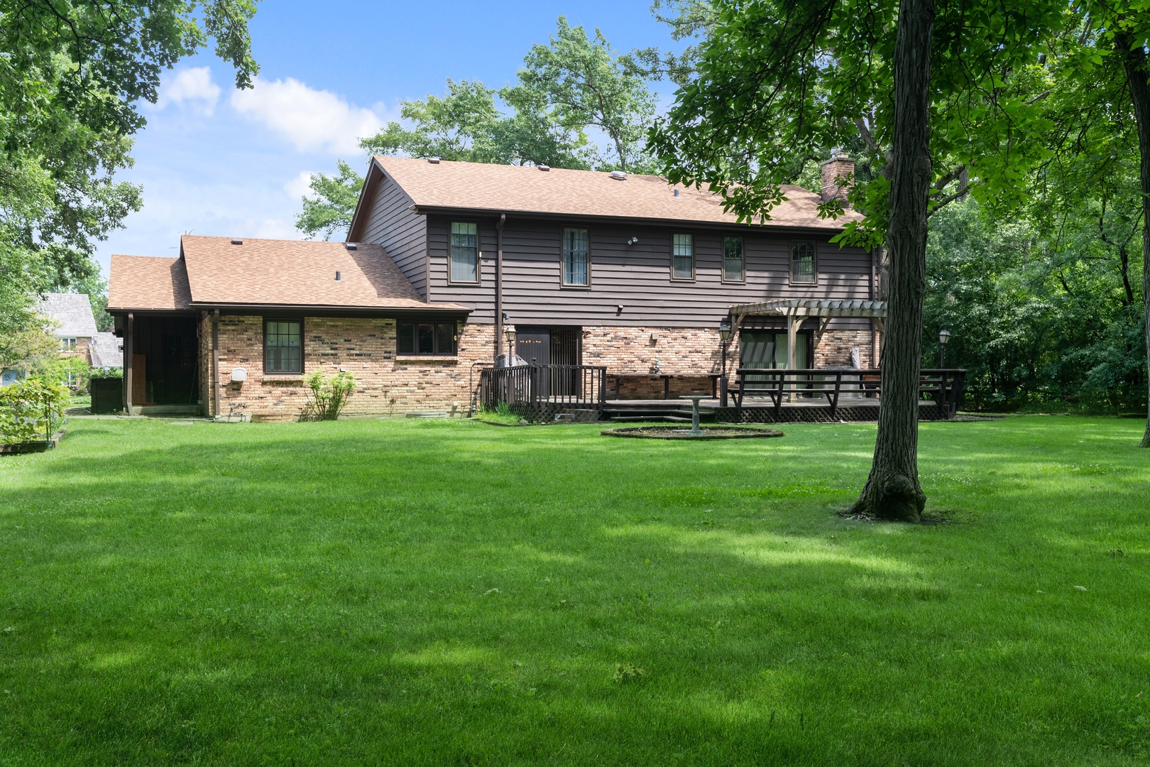 60 North Ridge Road Lake Forest, IL 60045 - Photo 33 of 36 a front view of a house with a yard