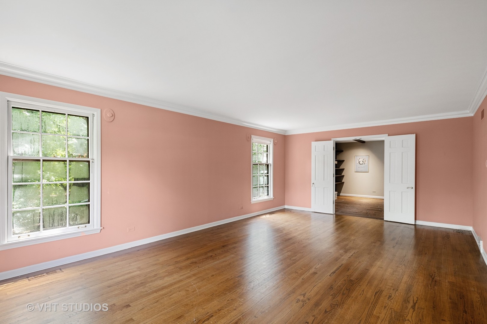 60 North Ridge Road Lake Forest, IL 60045 - Photo 6 of 36 a view of an empty room with wooden floor and a window