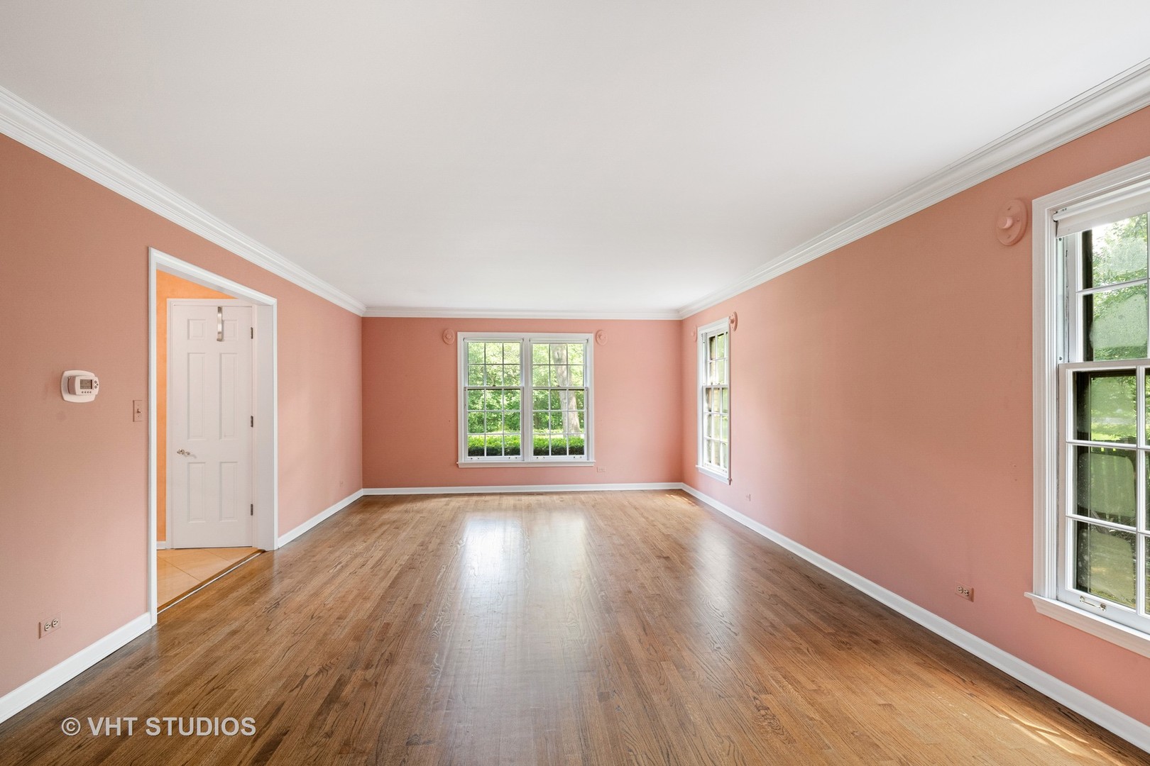 60 North Ridge Road Lake Forest, IL 60045 - Photo 7 of 36 an empty room with wooden floor and windows