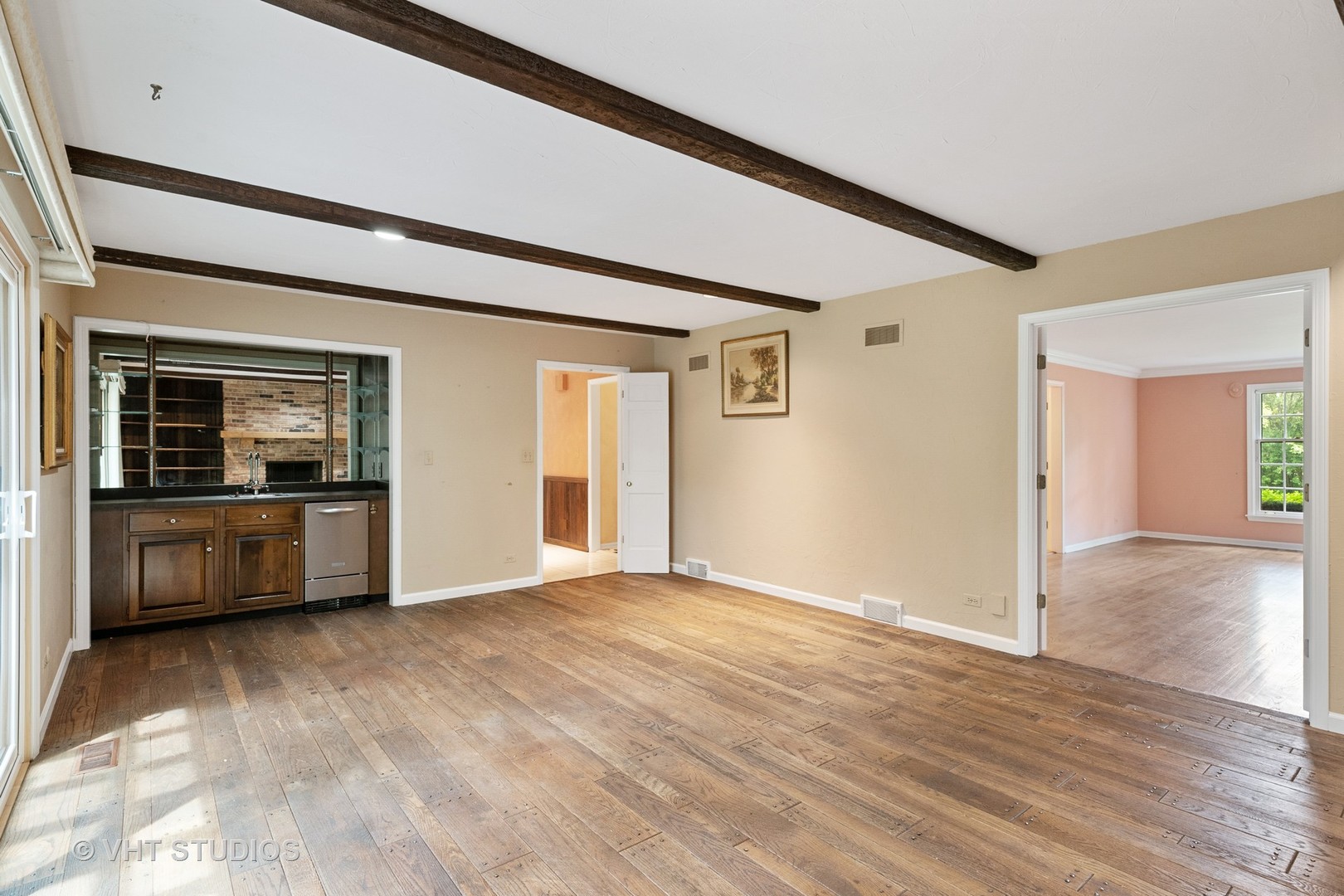 60 North Ridge Road Lake Forest, IL 60045 - Photo 10 of 36 a view of empty room with wooden floor and kitchen