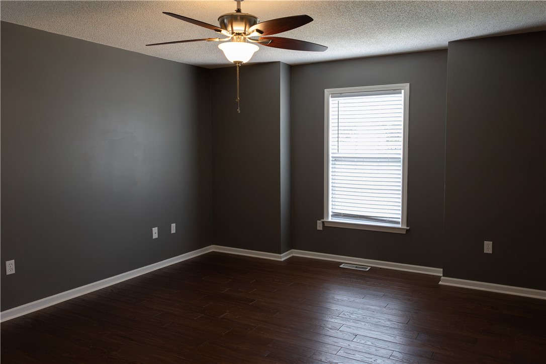 439 Chetola Road Seneca, SC 29672 - Photo 23 of 28 Rich hardwood floors complement the clean lines and generous natural window light in this room.