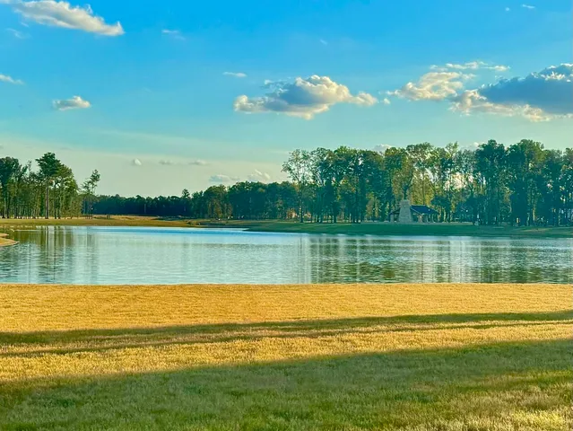 a view of a swimming pool with an ocean view