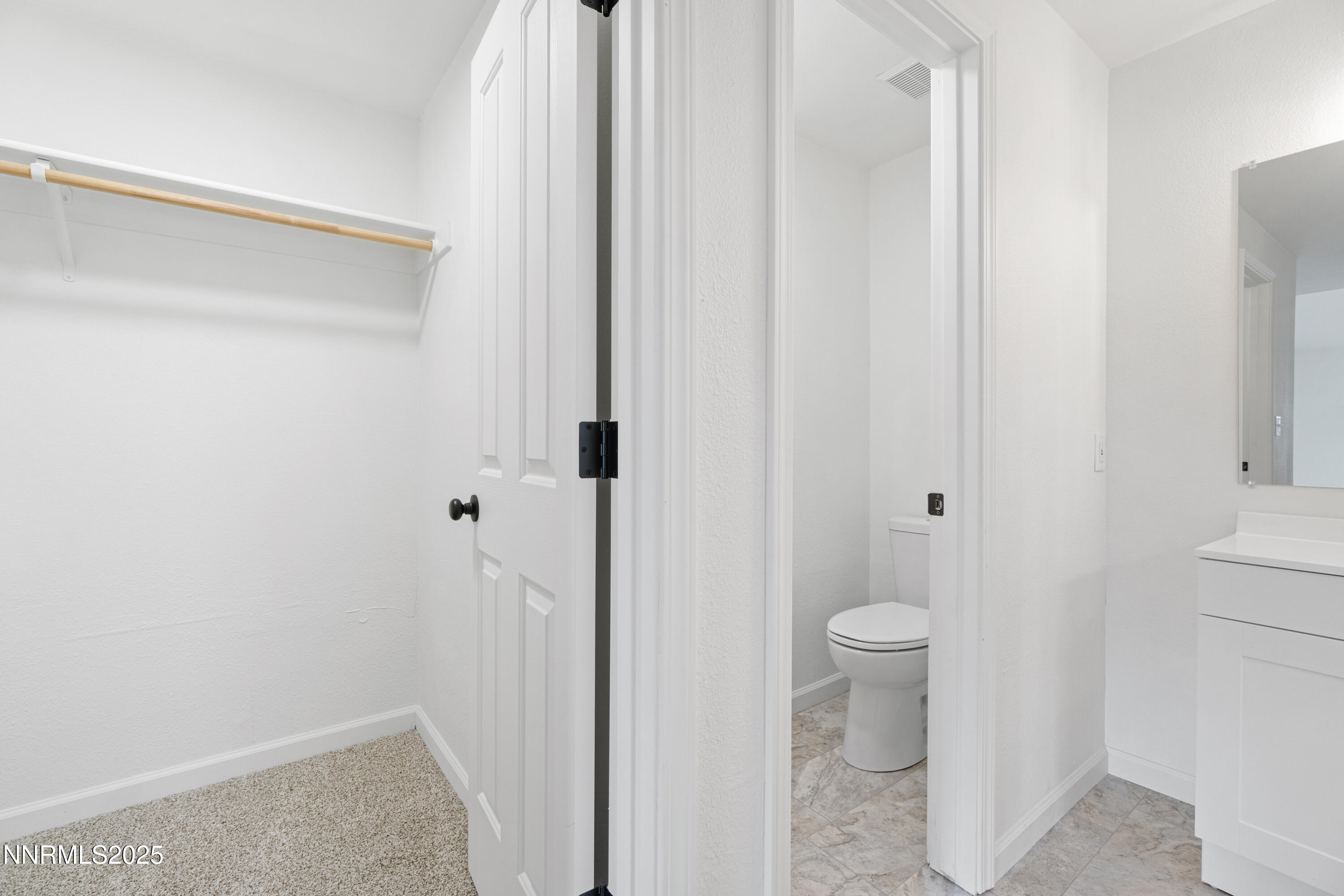 123 Shadow Mountain Drive Fernley, NV 89408 - Photo 24 of 28 a bathroom with a toilet and a shower