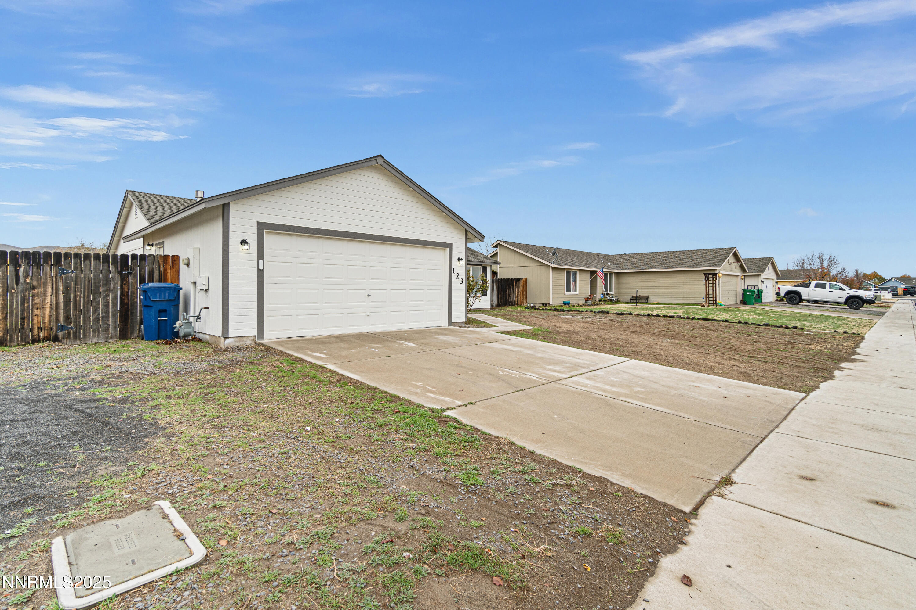 123 Shadow Mountain Drive Fernley, NV 89408 - Photo 4 of 28 a house with yard in front of it
