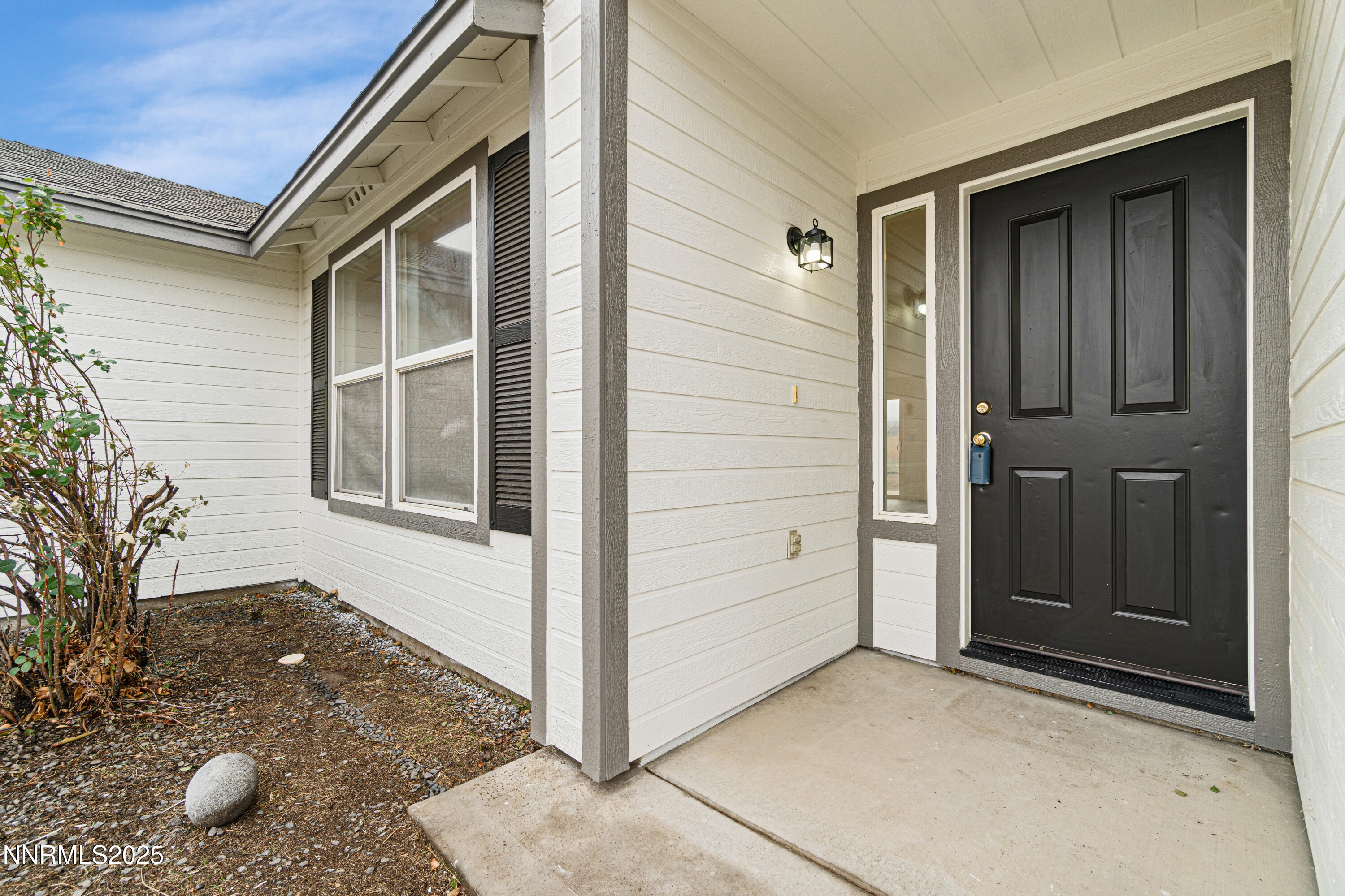 123 Shadow Mountain Drive Fernley, NV 89408 - Photo 5 of 28 a view of a house with backyard space