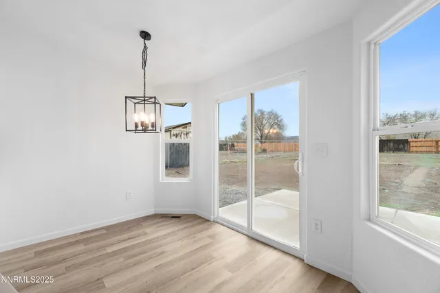 a view of empty room with windows