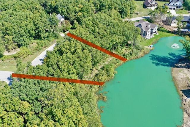 746 Ketill Court Crown Point, IN 46307 - Photo 3 of 12 a backyard of a house with a yard and outdoor seating