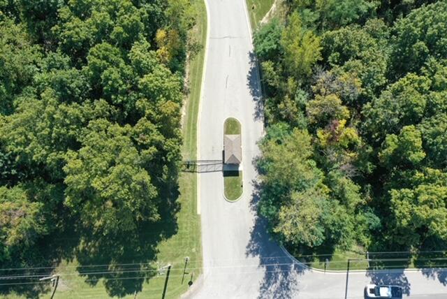 746 Ketill Court Crown Point, IN 46307 - Photo 9 of 12 a balcony with tall trees