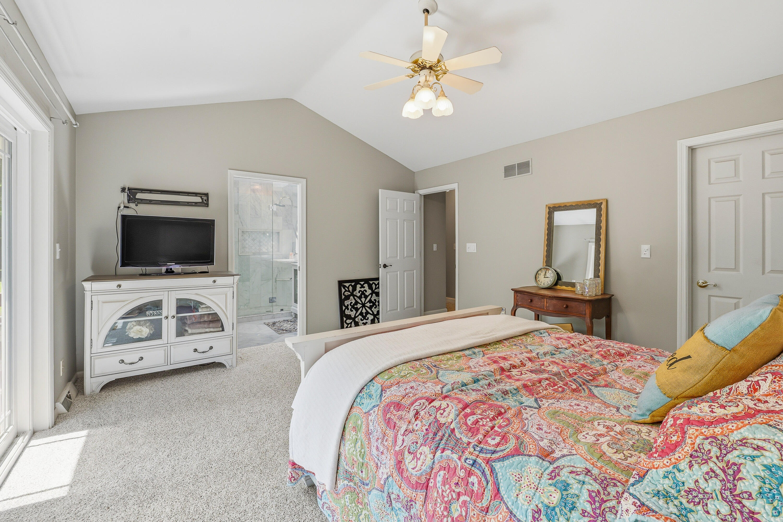 34899 Pabst Road Summit, WI 53066 - Photo 15 of 38 Primary suite with updated bath, walk-in closet, and a private retreat-like feel.