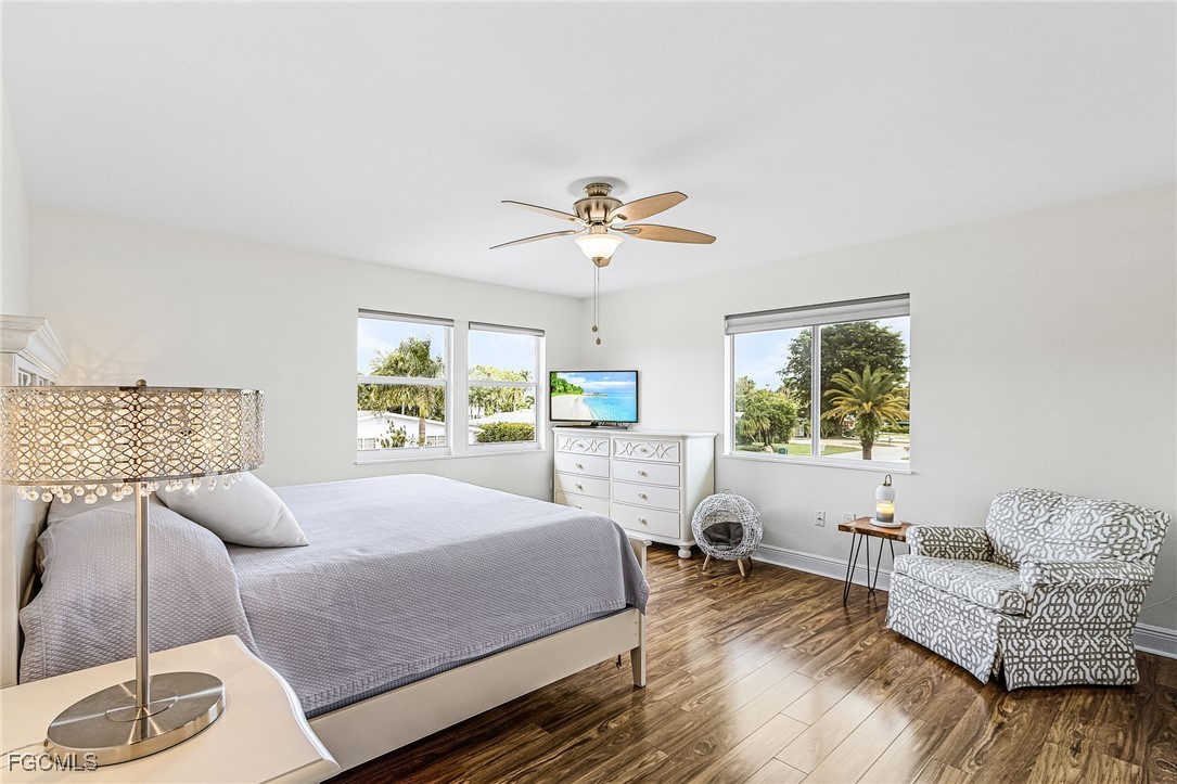 1060 Cooper Drive Naples, FL 34103 - Photo 23 of 33 a living room with furniture and a large window