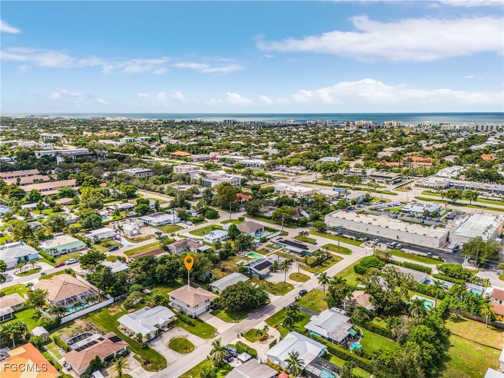 1060 Cooper Drive Naples, FL 34103 - Photo 30 of 33 an aerial view of residential building with parking space