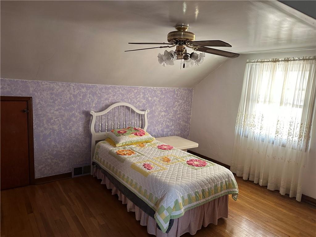 2nd Bedroom with Hardwood floors throughout house