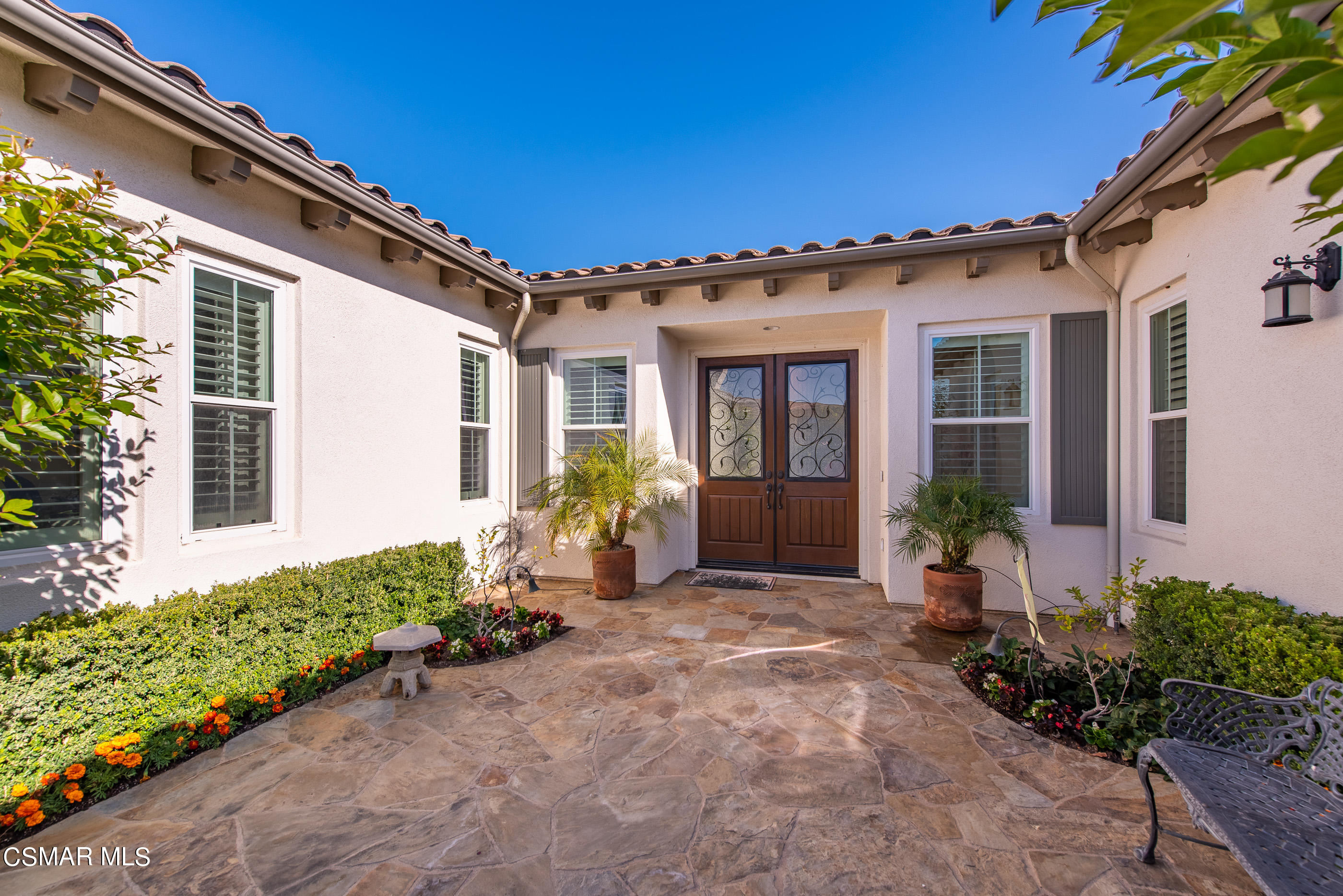 13740 Pinefield Court Moorpark, CA 93021 - Photo 2 of 62 a front view of a house with a garden