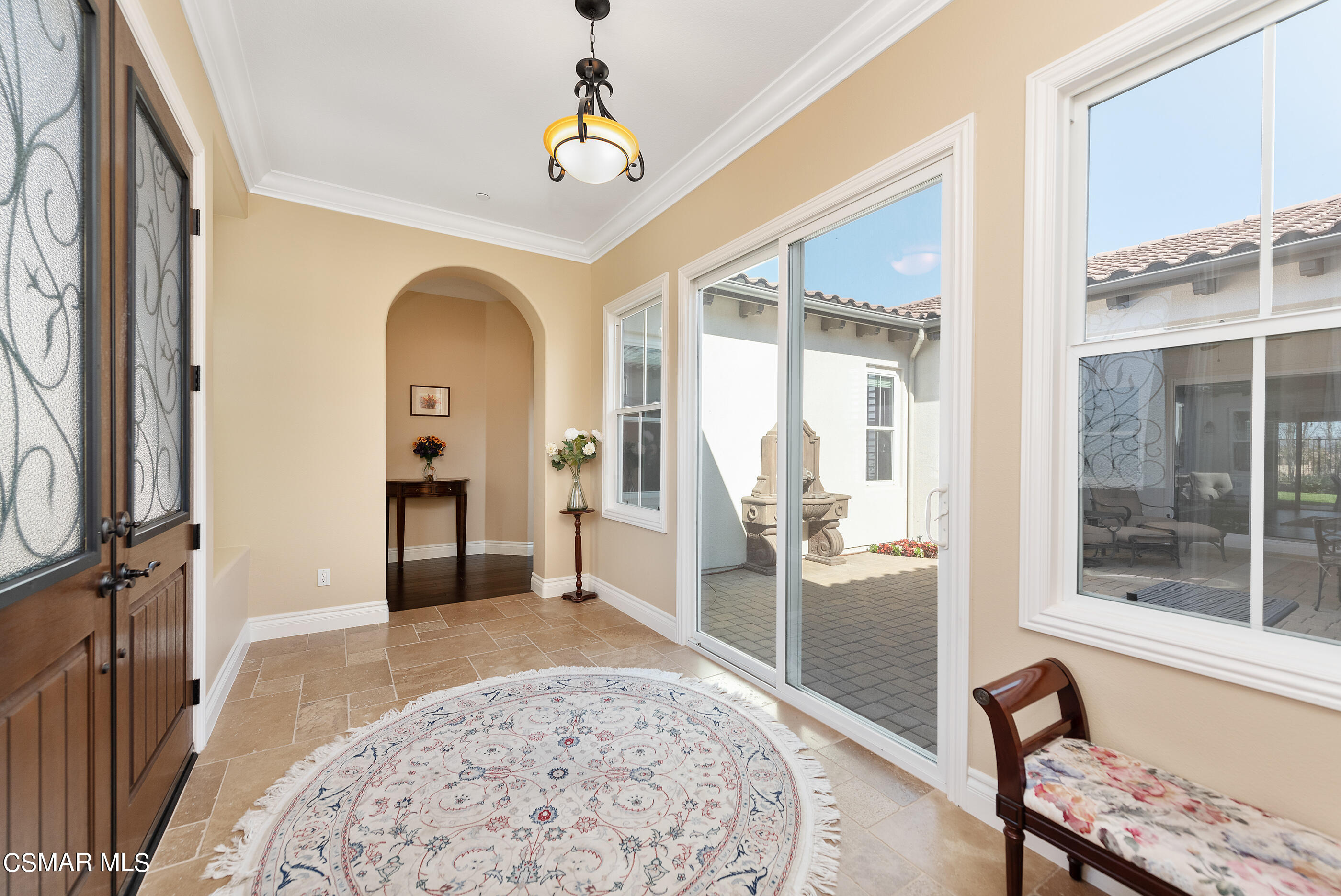 13740 Pinefield Court Moorpark, CA 93021 - Photo 3 of 62 a view of a hallway with furniture and windows