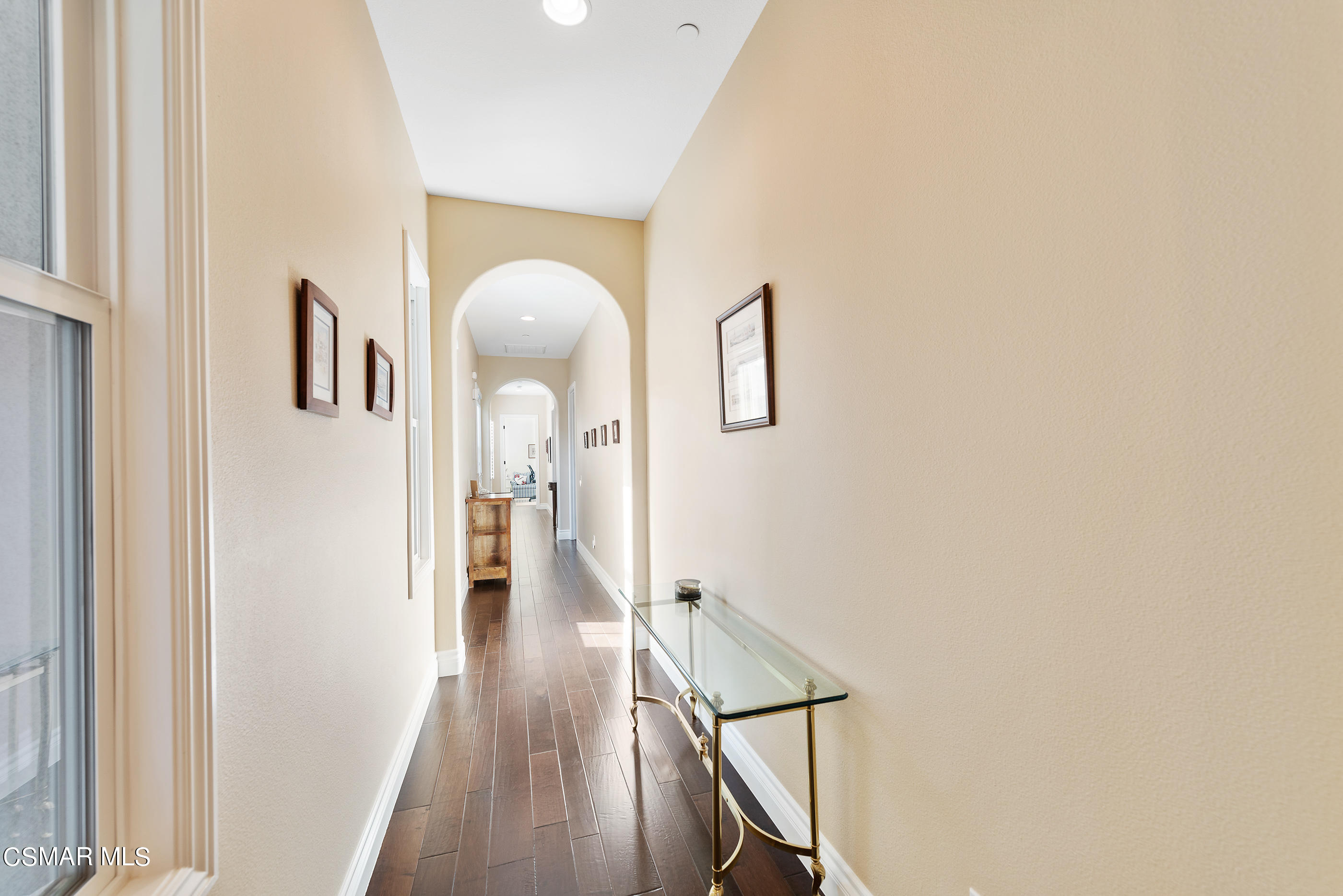 13740 Pinefield Court Moorpark, CA 93021 - Photo 22 of 62 a view of a hallway with wooden floor and staircase
