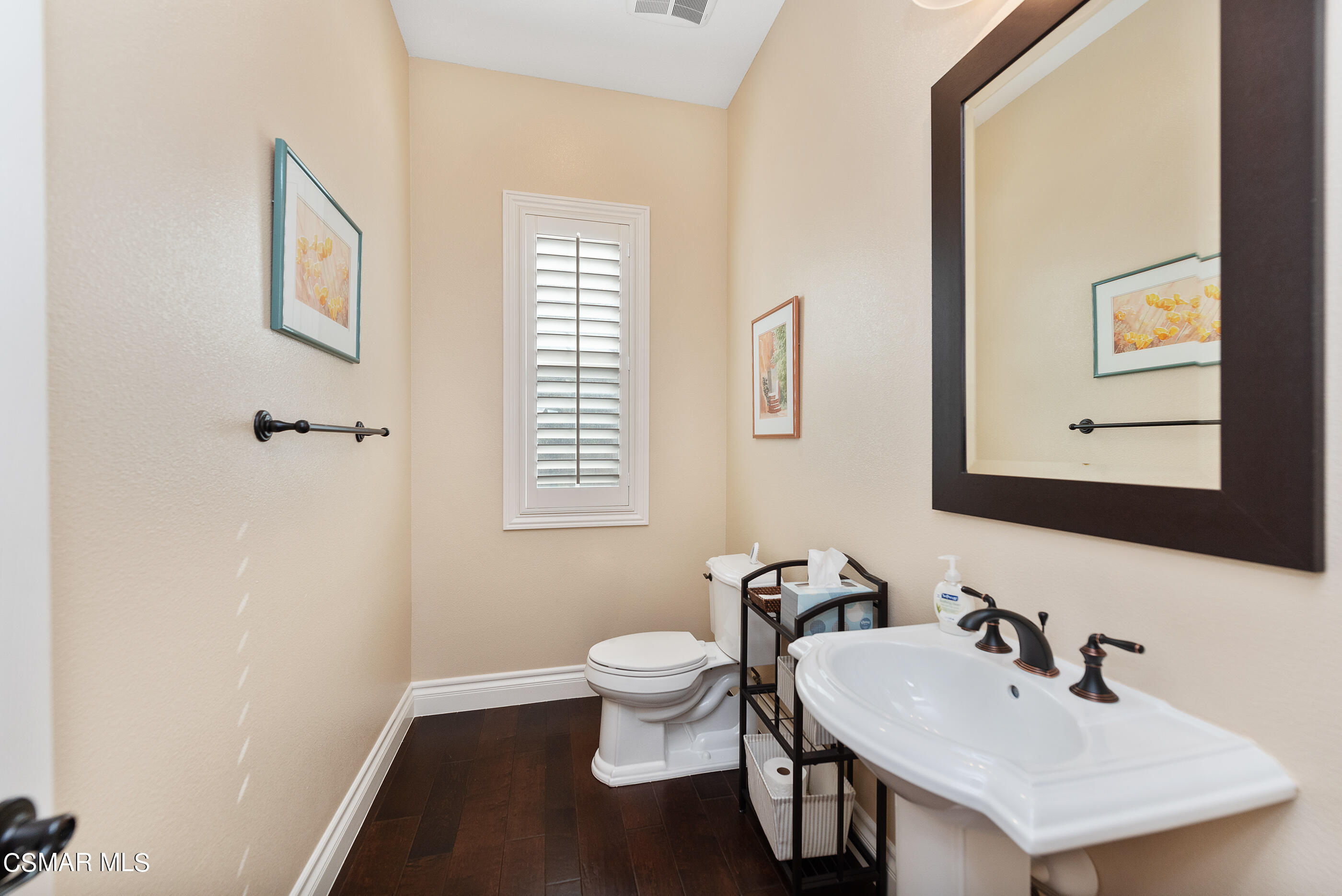 13740 Pinefield Court Moorpark, CA 93021 - Photo 24 of 62 a bathroom with a sink and a toilet