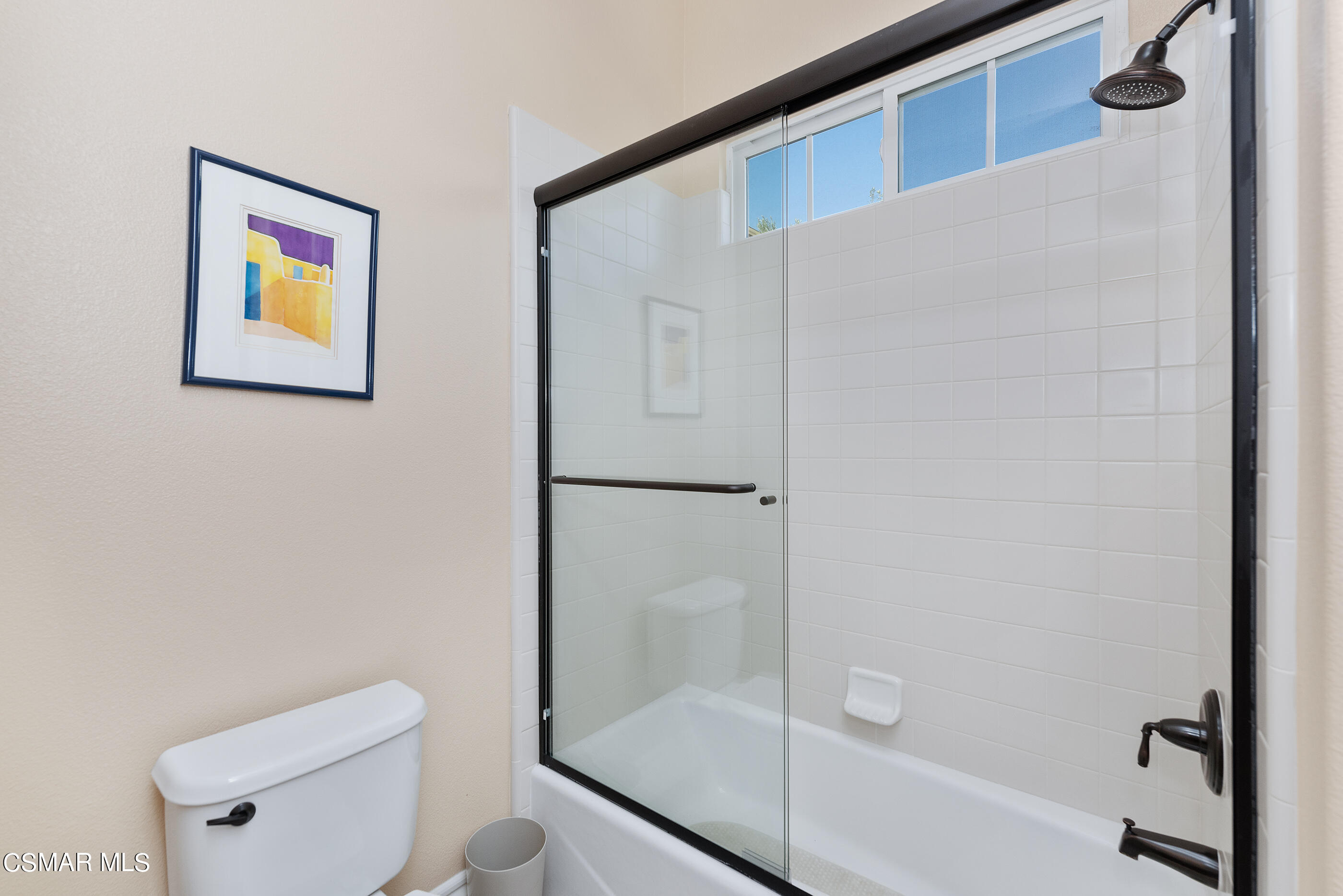 13740 Pinefield Court Moorpark, CA 93021 - Photo 27 of 62 a bathroom with a shower and toilet