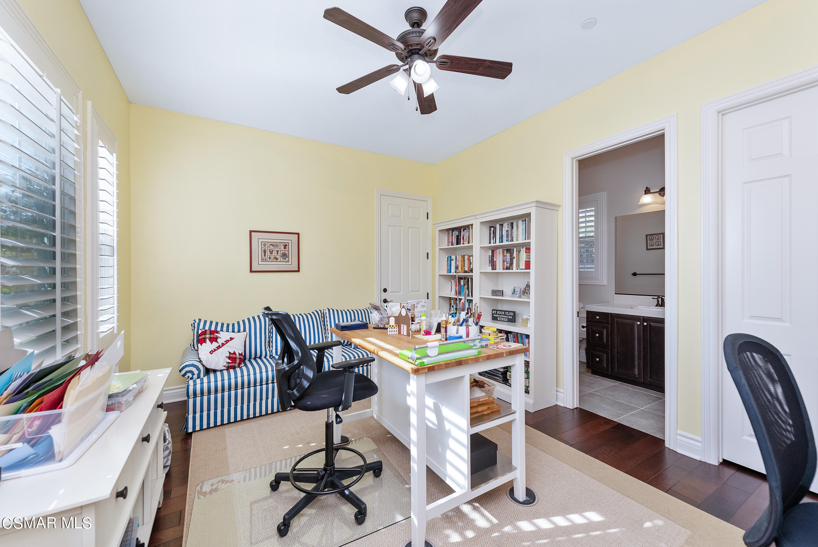 13740 Pinefield Court Moorpark, CA 93021 - Photo 29 of 62 a work room with furniture and wooden floor