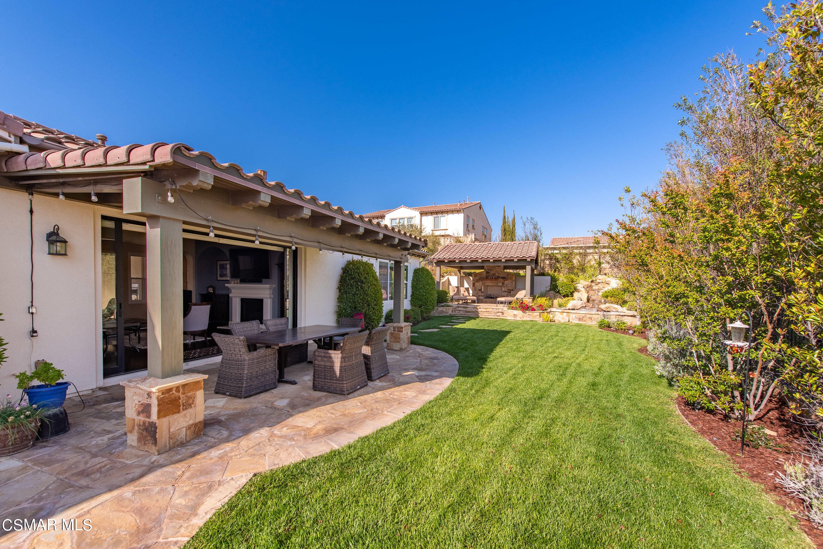 13740 Pinefield Court Moorpark, CA 93021 - Photo 42 of 62 a view of a house with backyard porch and sitting area