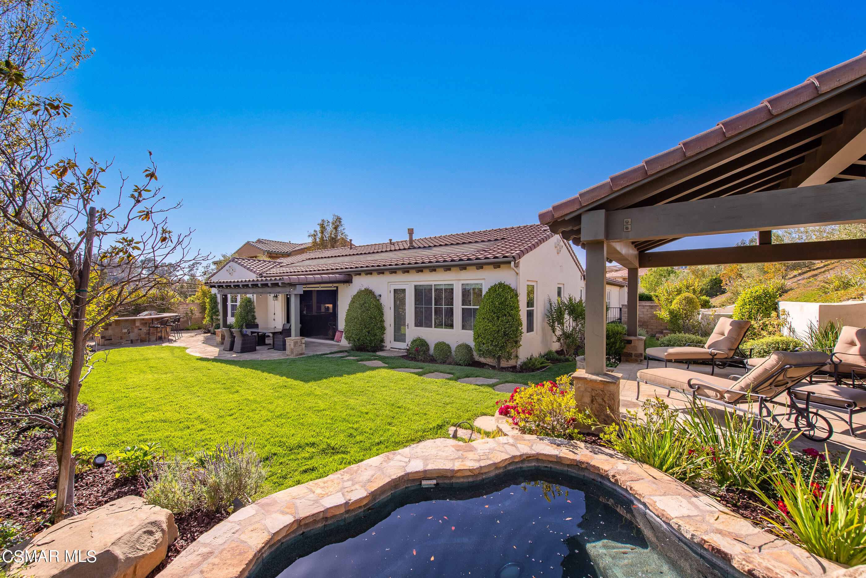 13740 Pinefield Court Moorpark, CA 93021 - Photo 47 of 62 a view of a house with backyard and sitting area