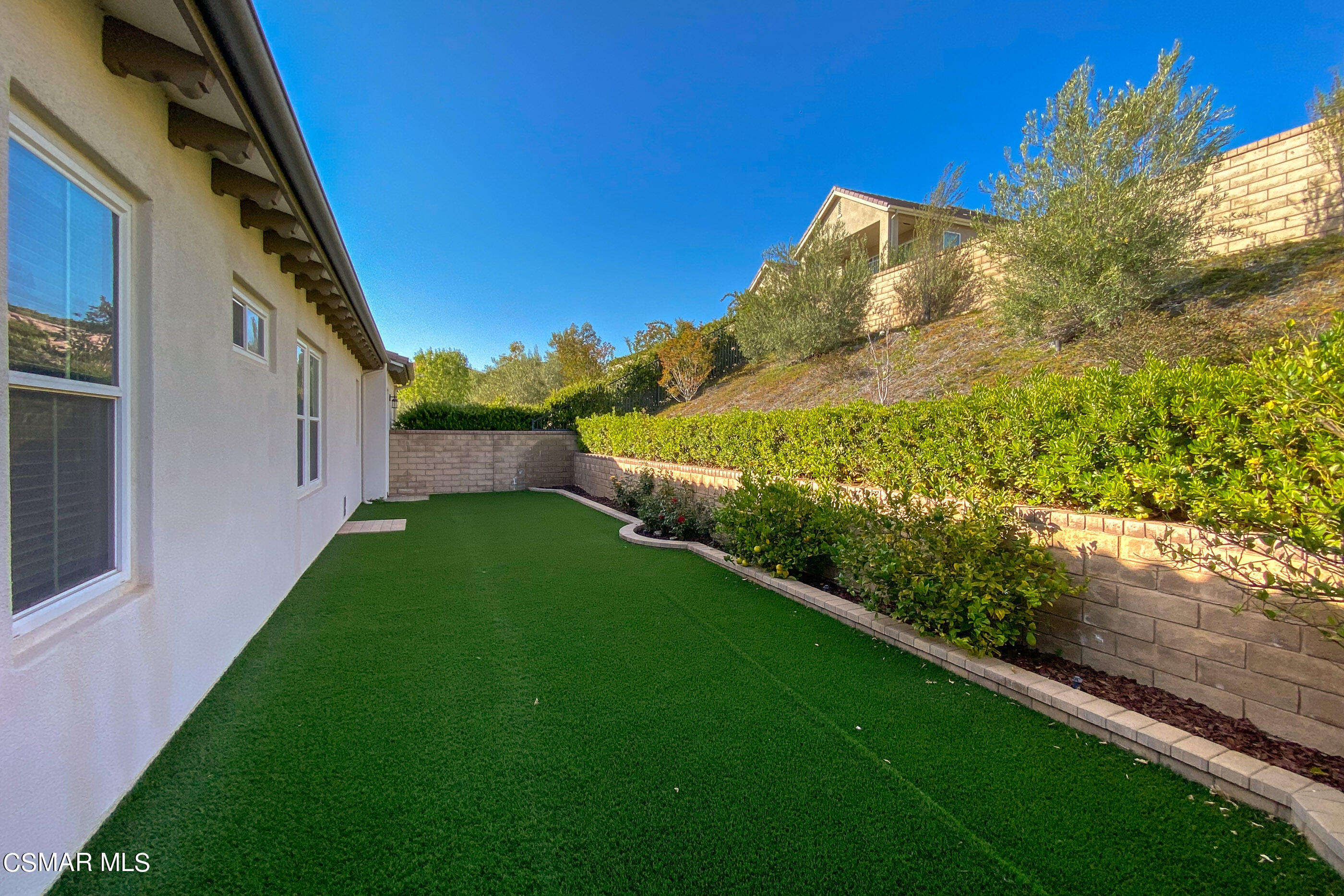 13740 Pinefield Court Moorpark, CA 93021 - Photo 49 of 62 a view of a back yard of the house