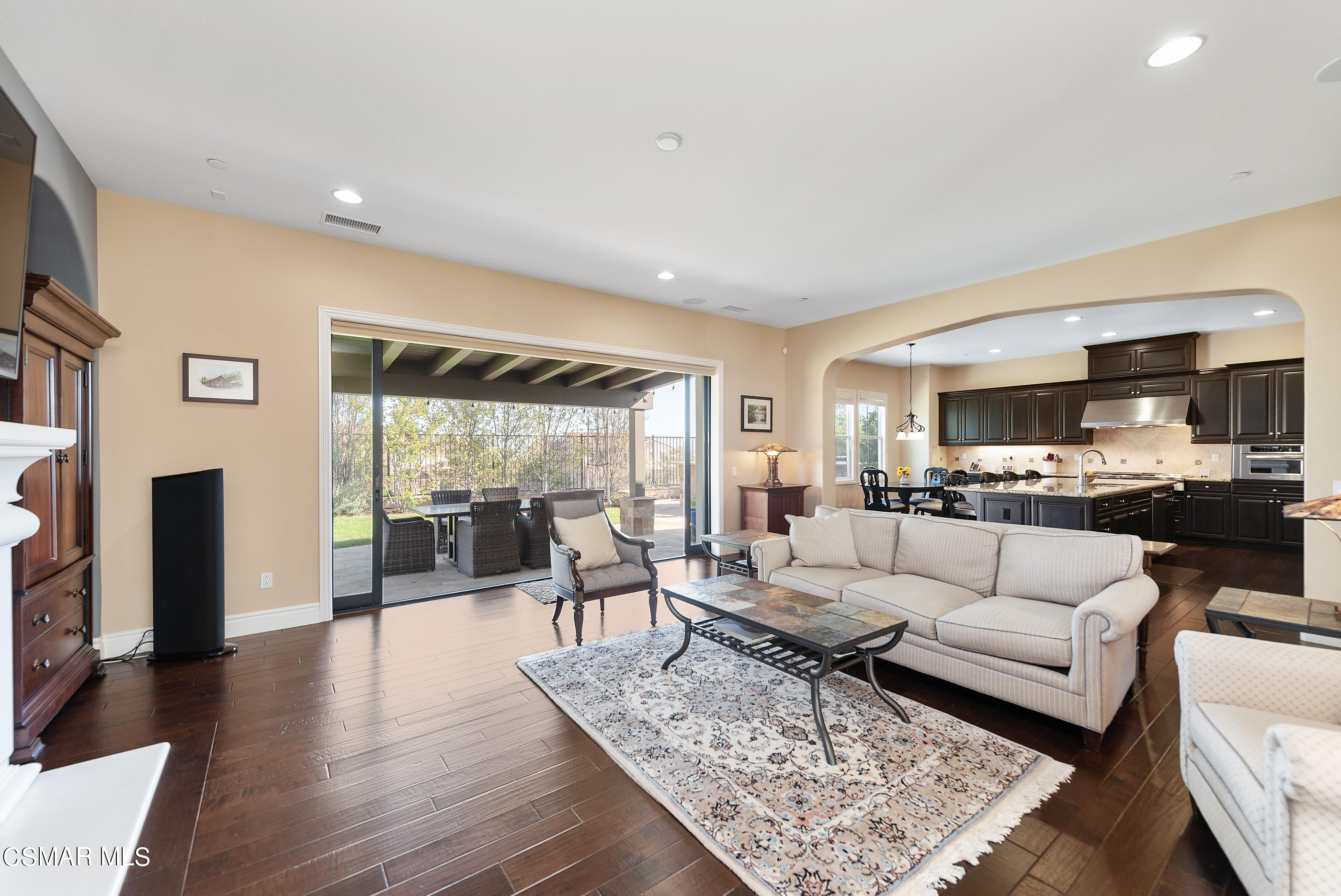 13740 Pinefield Court Moorpark, CA 93021 - Photo 10 of 62 a living room with furniture and a wooden floor