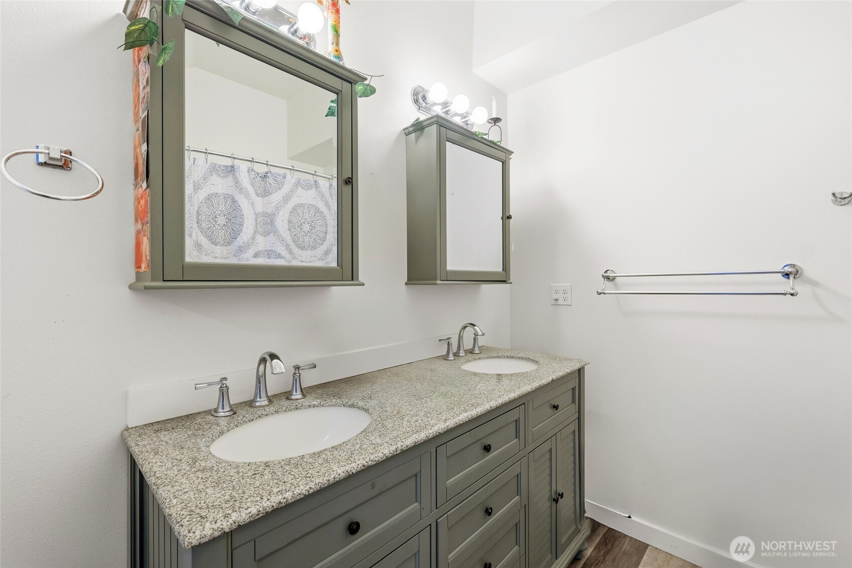 856 Northwest Folsom Street Chehalis, WA 98532 - Photo 17 of 38 a bathroom with a granite countertop sink and a mirror