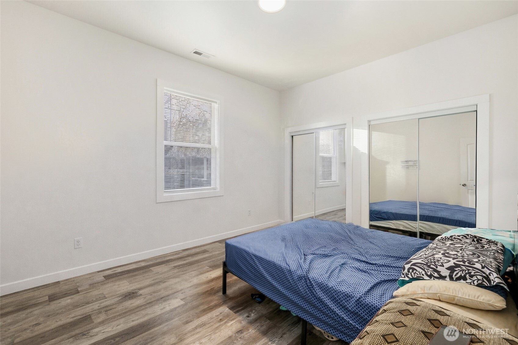 856 Northwest Folsom Street Chehalis, WA 98532 - Photo 19 of 38 a bedroom with a bed and a window