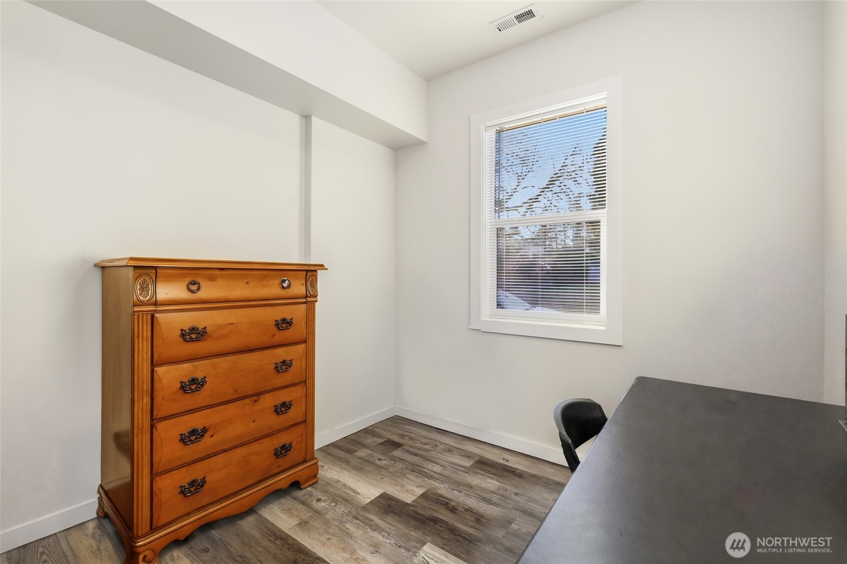 856 Northwest Folsom Street Chehalis, WA 98532 - Photo 21 of 38 a view of a dresser with wooden floor