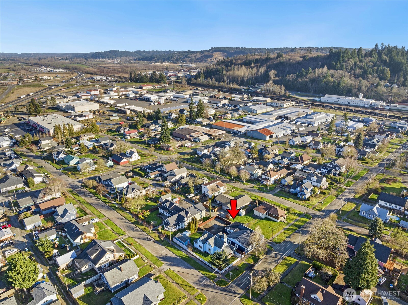 856 Northwest Folsom Street Chehalis, WA 98532 - Photo 34 of 38 an aerial view of residential houses with outdoor space and parking