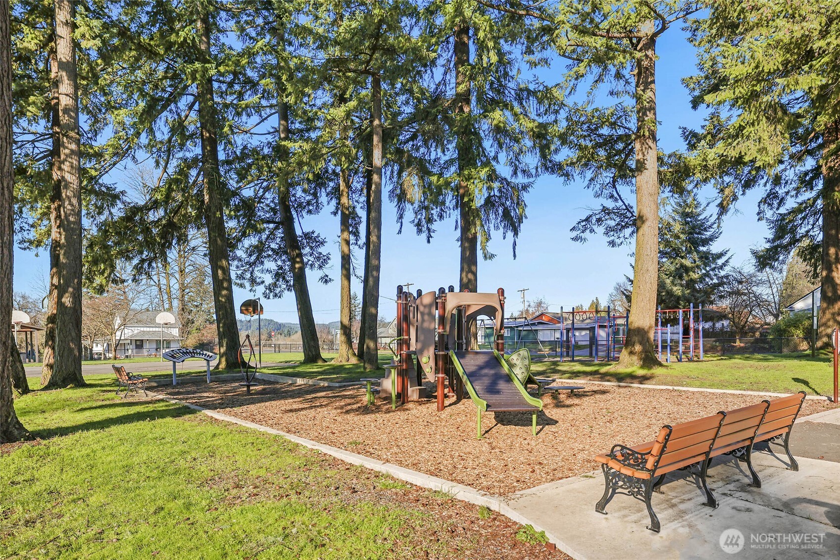 856 Northwest Folsom Street Chehalis, WA 98532 - Photo 37 of 38 a view of a park with swings and slides