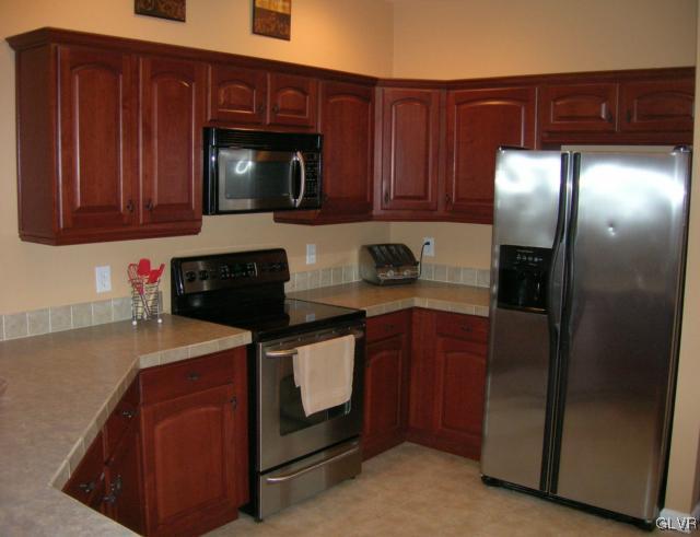 24 Spokane Road Albrightsville, PA 18210 - Photo 11 of 38 The kitchen features vaulted ceilings, recessed li