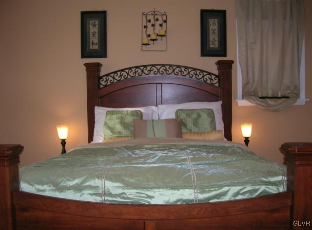 24 Spokane Road Albrightsville, PA 18210 - Photo 16 of 38 The Master bedroom currently fits a queen sized be