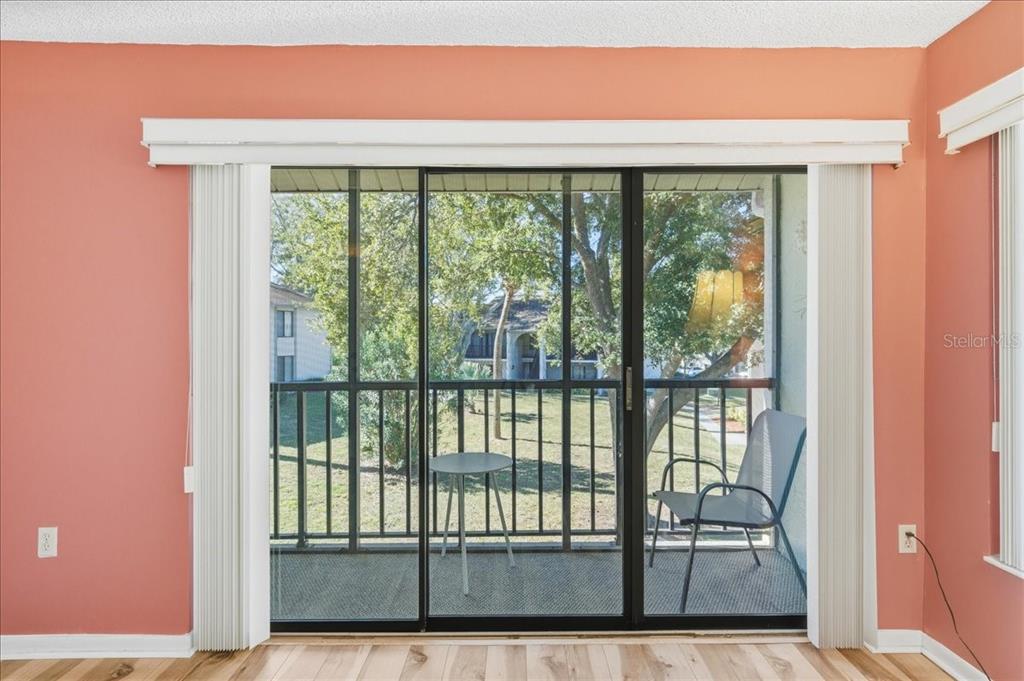 2666 Pine Ridge Way North, Unit C2 Palm Harbor, FL 34684 - Photo 9 of 74 a view of a balcony