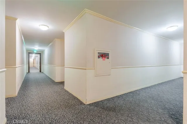 a view of a hallway with staircase