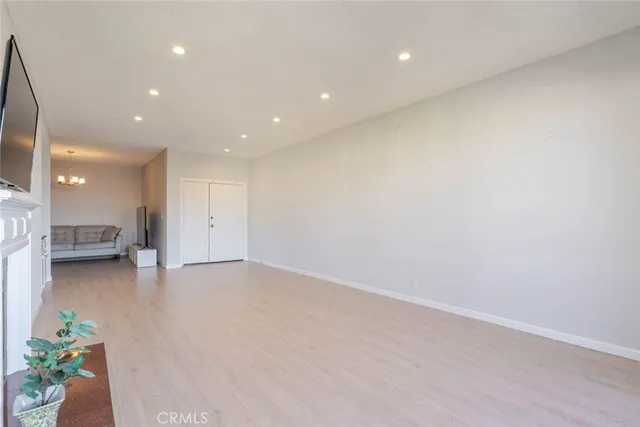 a view of a room with kitchen and living room