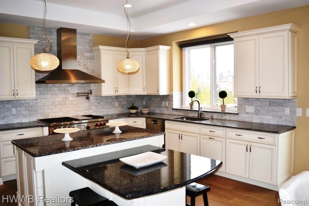 5676 Sovereign Drive Rochester, MI 48306 - Photo 28 of 68 Kitchen with Dual Island